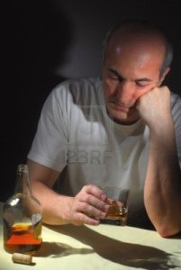 4981911-extreme-close-up-image-of-drunk-man-holding-a-glass-of-whiskey